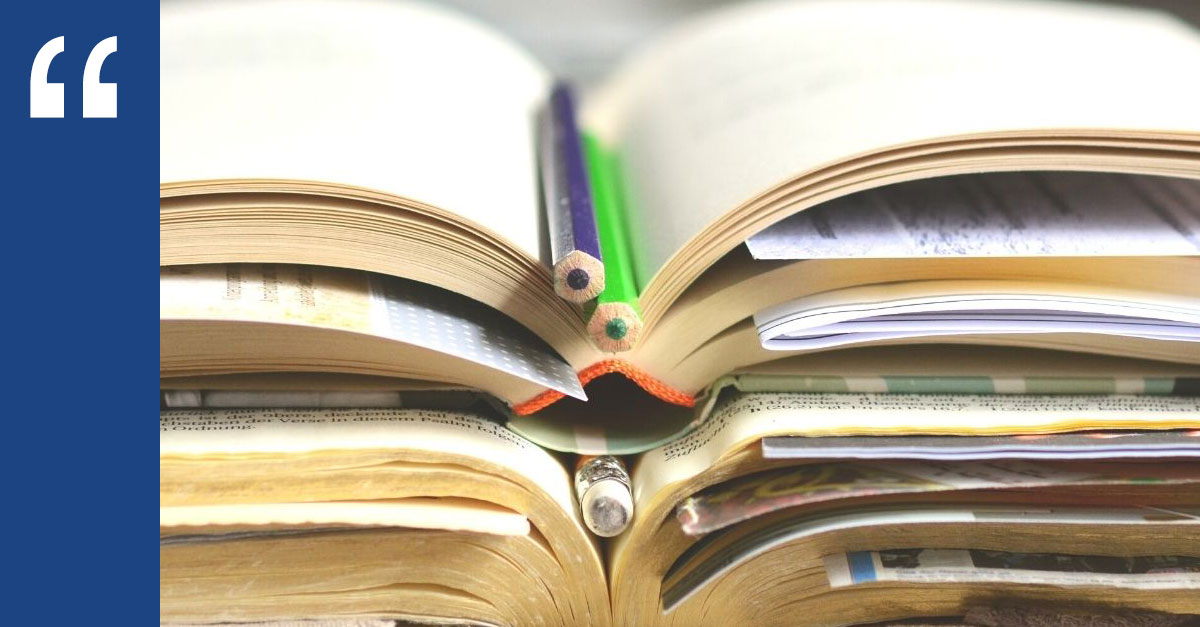 Stack of open books